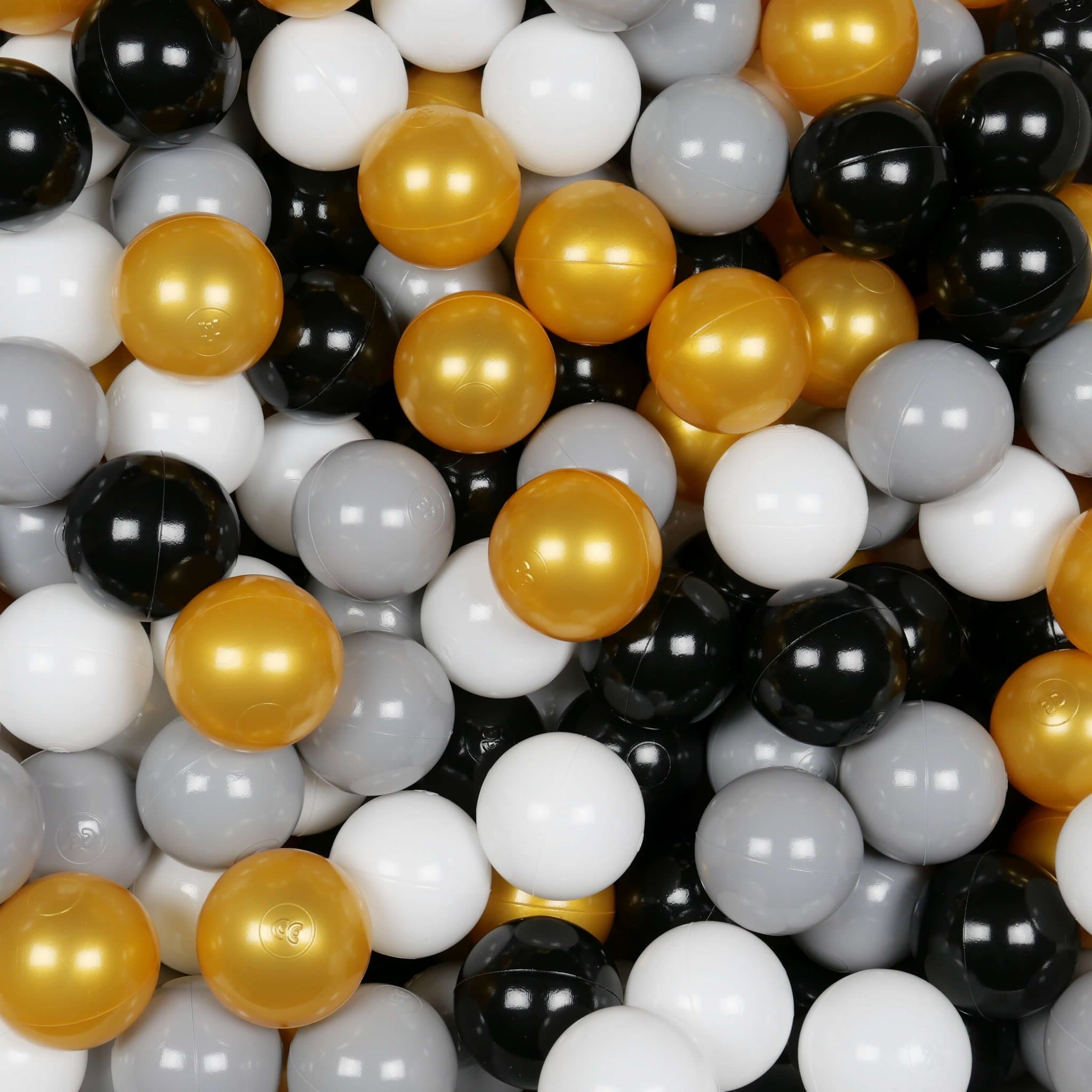 25 Spielbälle mit 7 cm Durchmesser in Weiß, Grau, Schwarz und Gold